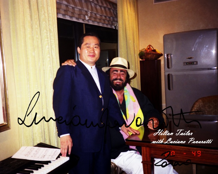 with.pavarotti.jpg Hosting at Sudaneseonline.com